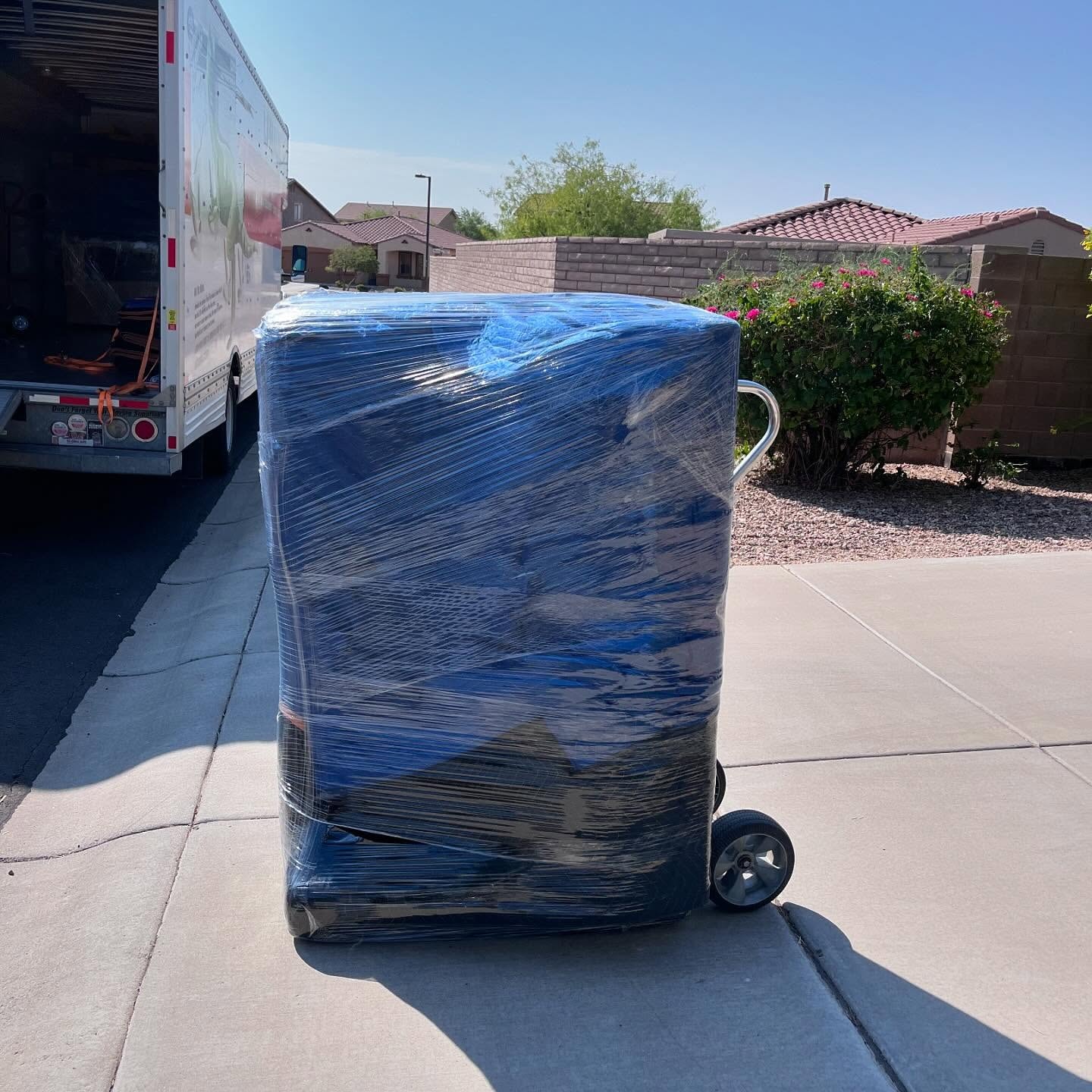 Husky Haulers moving truck fully loaded and ready for a Greater Phoenix area move